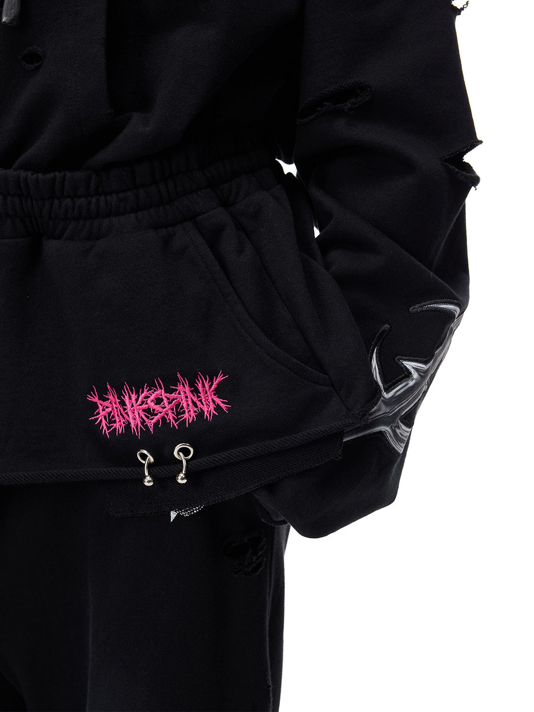 PINKSPINK MOHAWK RITUAL studded zip-up hoodie — pocket graphic and metal ring detail