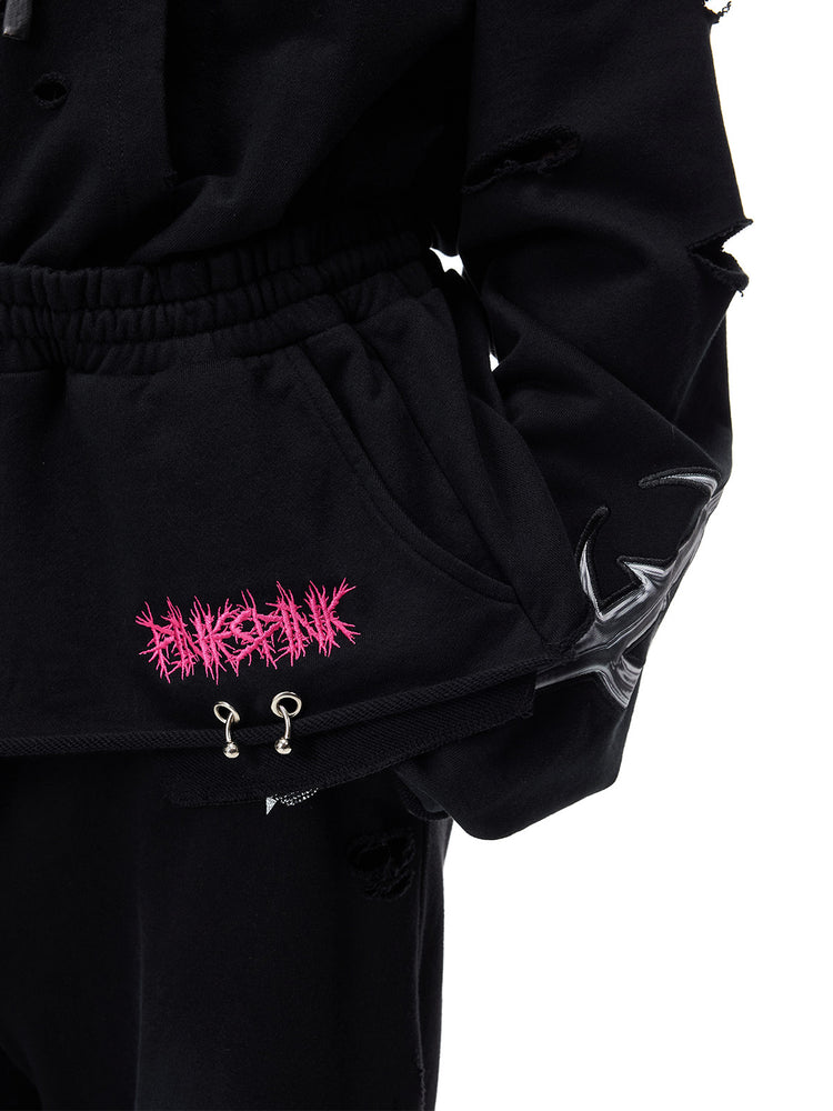 PINKSPINK MOHAWK RITUAL studded zip-up hoodie — pocket graphic and metal ring detail