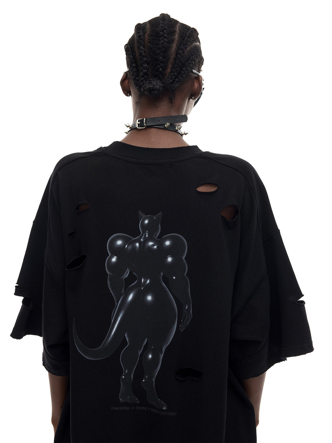 PINKSPINK FUTURE CAT distressed oversized tee in black — rear modeled close-up showing the back graphic