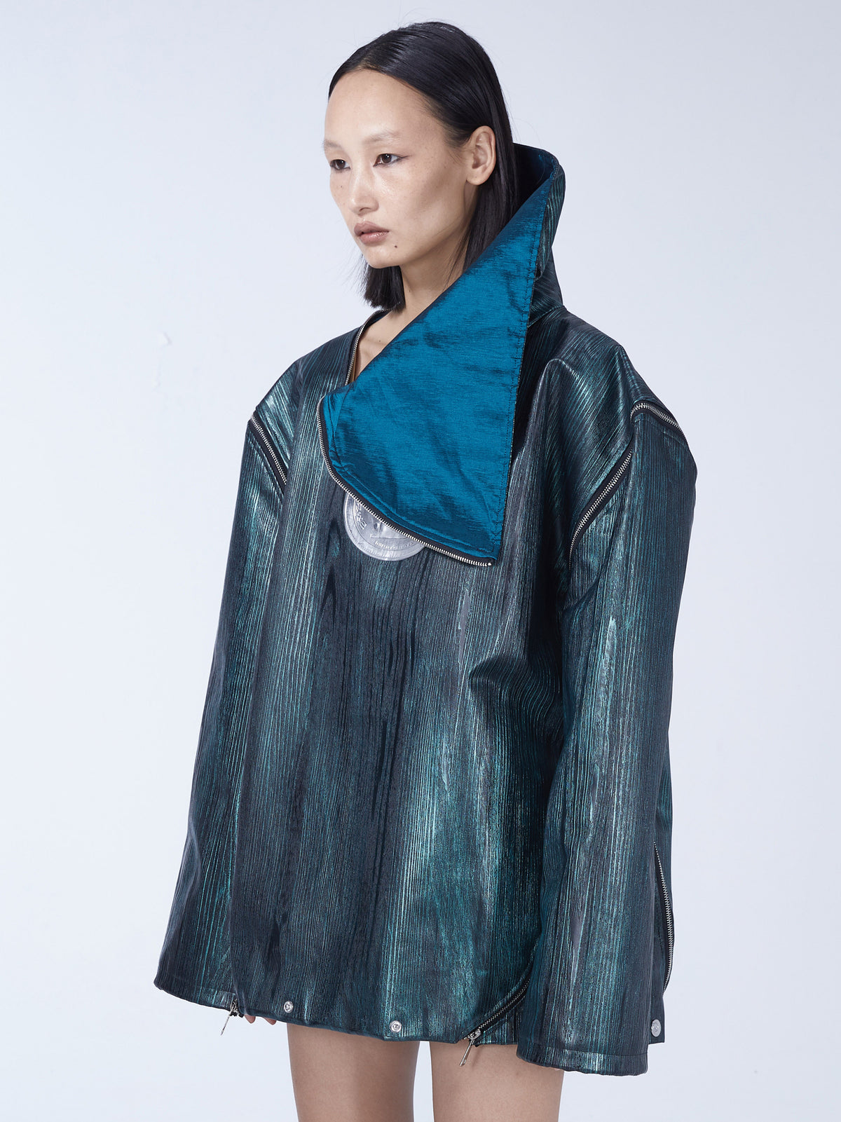 EMBRYO EXOSHELL convertible multi-zip hoodie vest — three-quarter modeled view