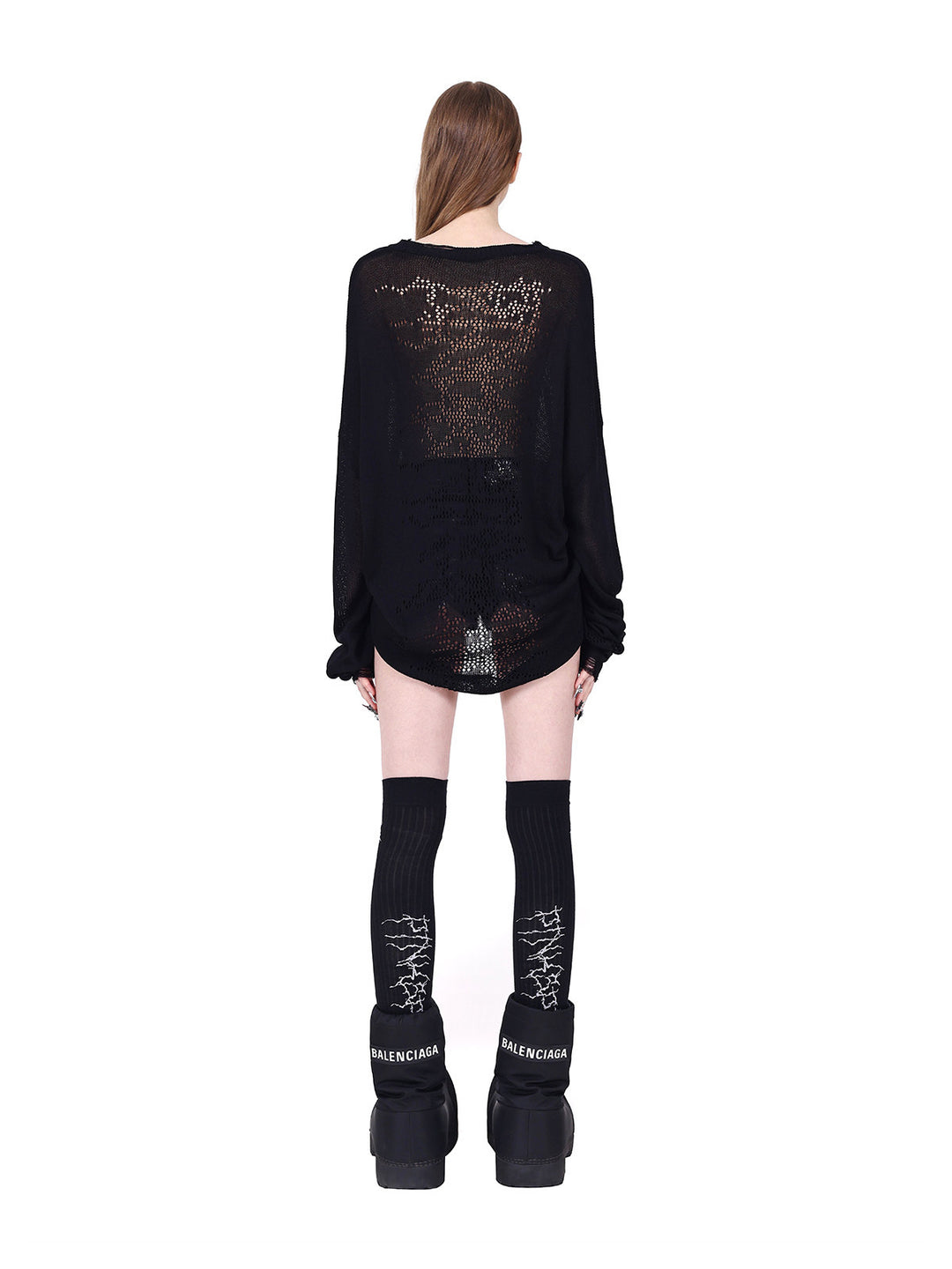 PINKSPINK ELECTRIC MOON distressed open-knit sweater in black — full-length rear view styled with separate shorts