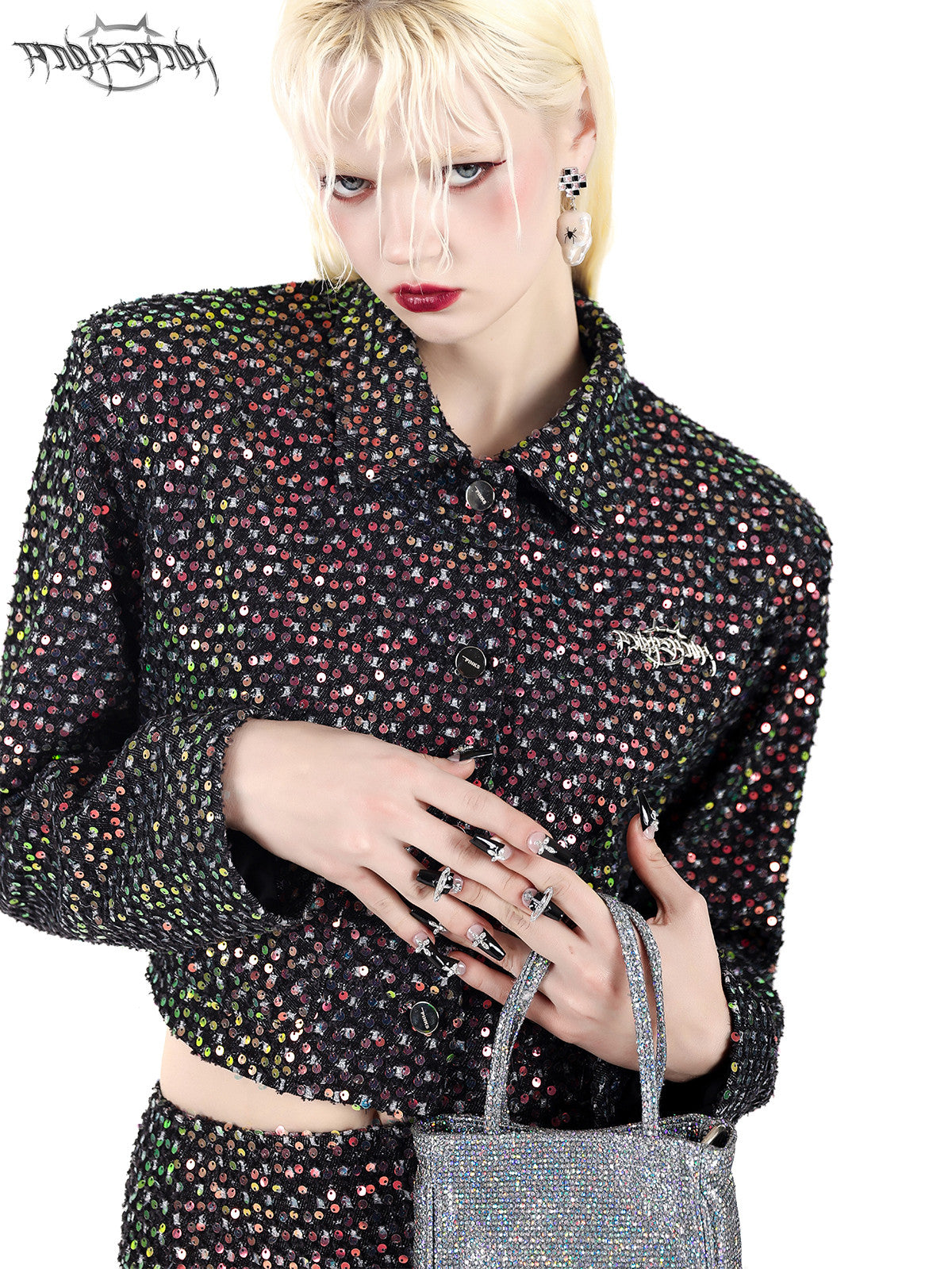 PINKSPINK SPARK sequined jacket and mini skirt set — black sequined jacket neckline and sleeve close-up