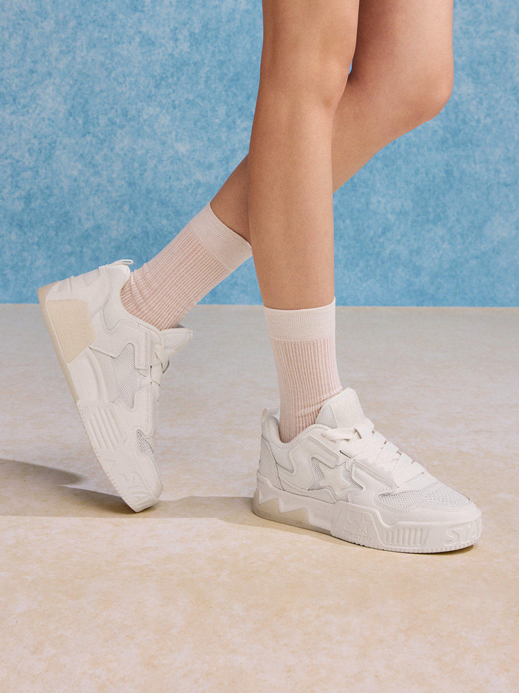 White STARTER VOL 90S mesh platform sneakers worn standing, front and side view
