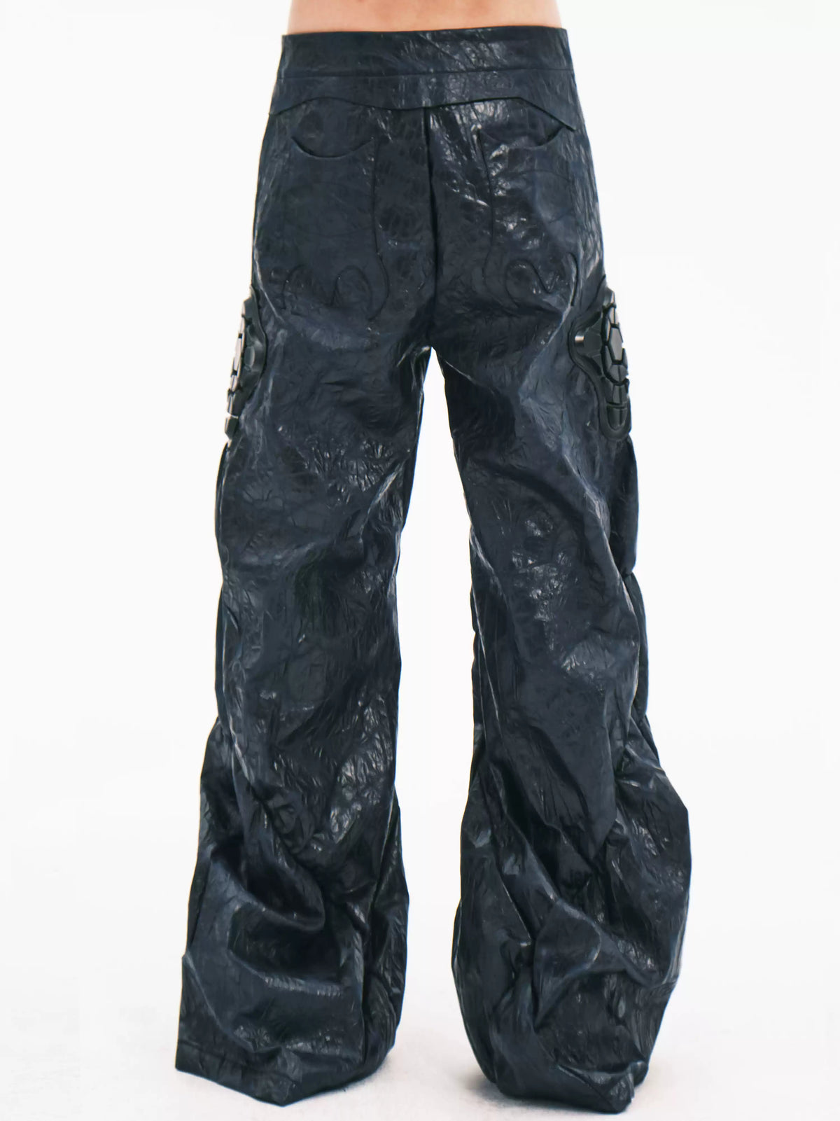EMBRYO GUARD SHELL ruched PU leather flare pants — back modeled view