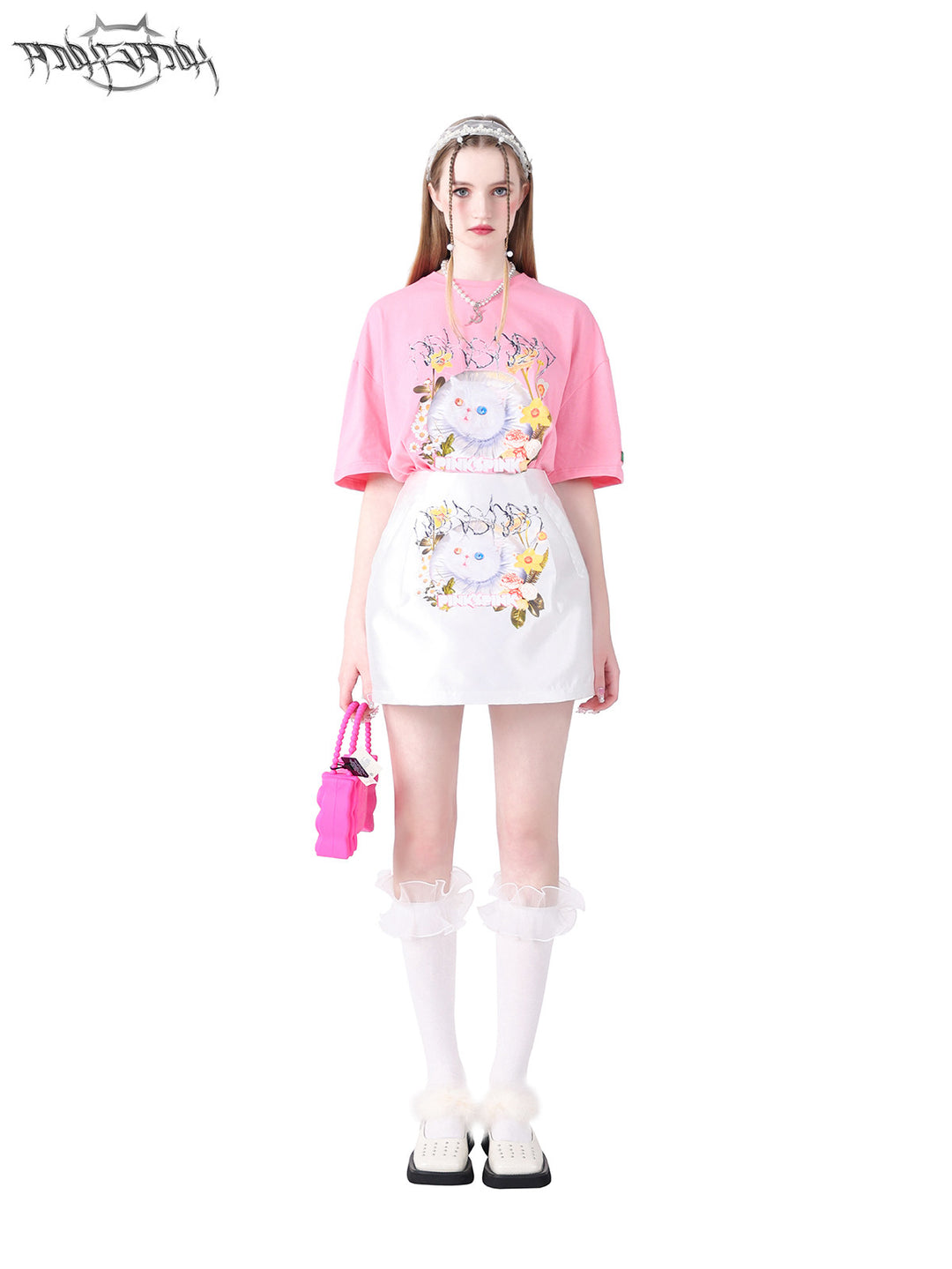 PINKSPINK GARFIELD graphic mini skirt — white front modeled view with the matching pink tee