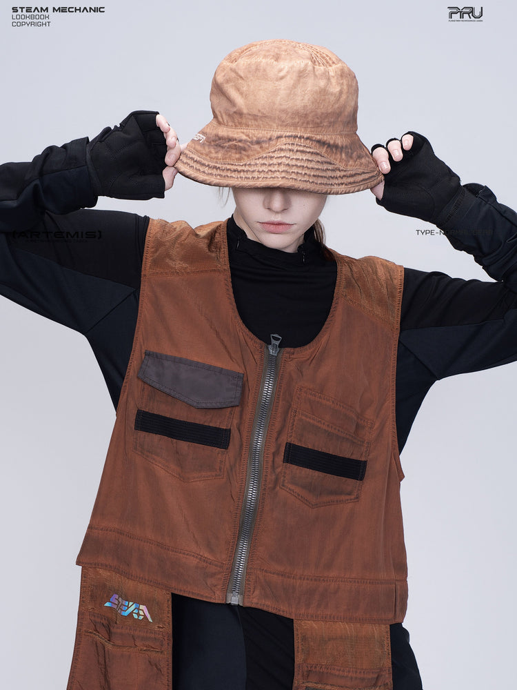 PIONEER venus orange distressed nylon bucket hat — front modeled view with both hands holding the brim
