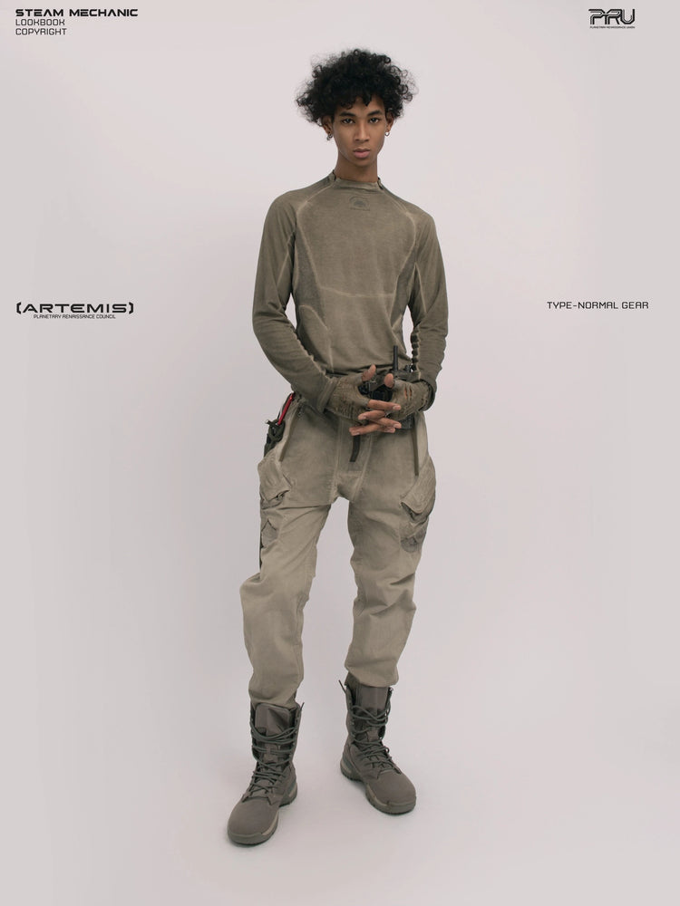 TWIN STAR lunar soil teal stretch riding base-layer top — full-length front view with hands clasped