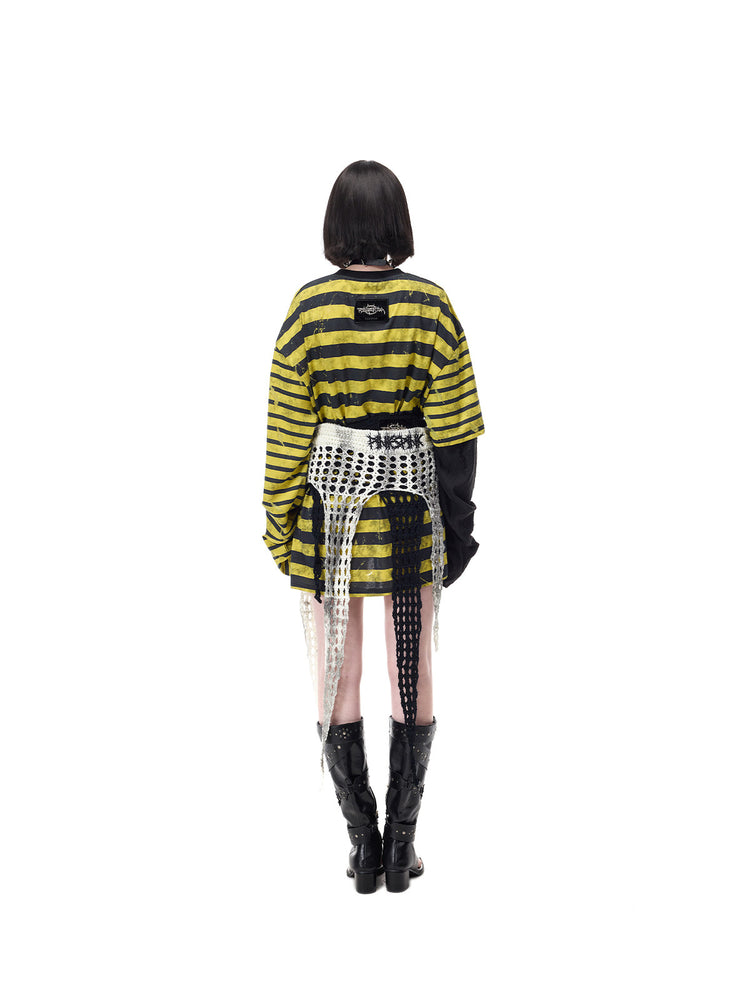 PINKSPINK THORNSTAR open-knit layering skirt in ivory white — full-length rear outfit view layered with a separate black skirt