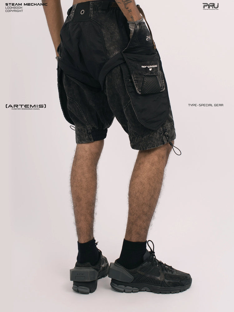 ARTEMIS blackbird black detachable technical shorts — rear three-quarter view showing utility pocket