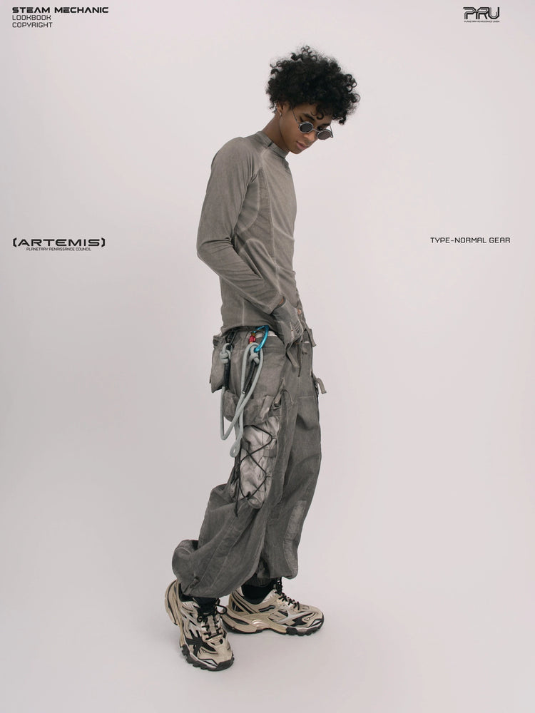 TWIN STAR meteor gray stretch riding base-layer top — full-length profile view looking down