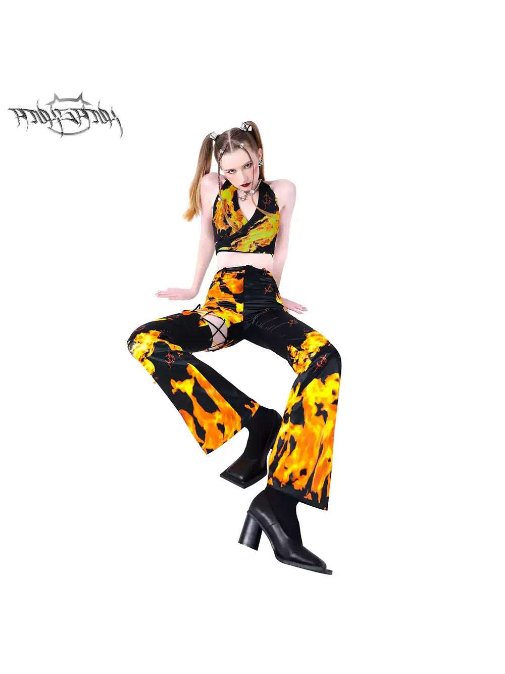 PINKSPINK ELECTRIC MOON cutout detachable flare pants — modeled front styling view