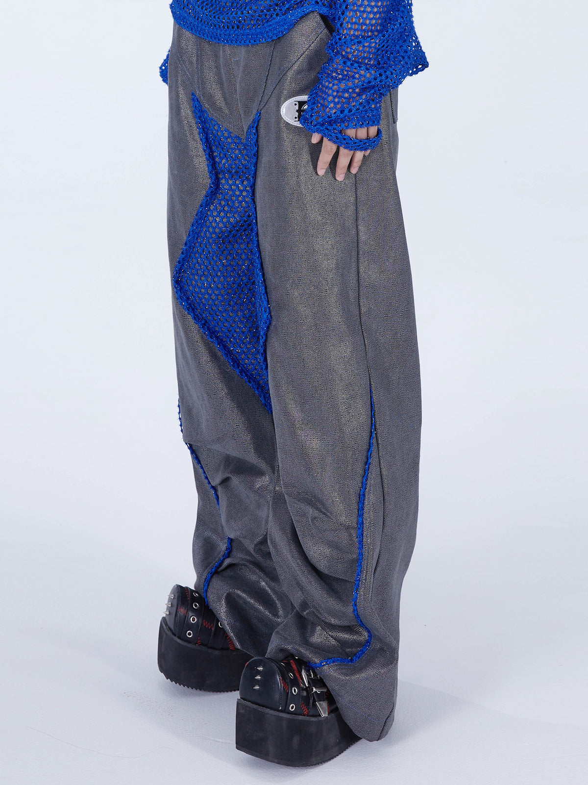 EMBRYO REVERSE CORE metallic canvas wide-leg pants — silver-gray angled detail view