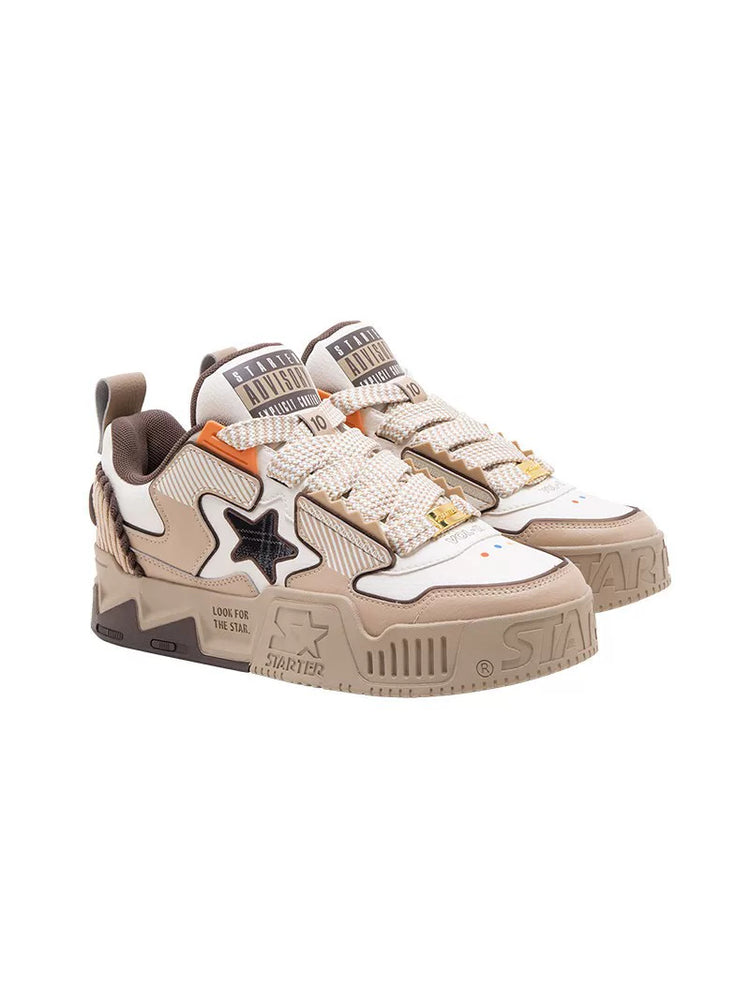 STARTER VOL 90S SONIC Coffee pair in a clean three-quarter studio view with broad laces and star-panel platforms