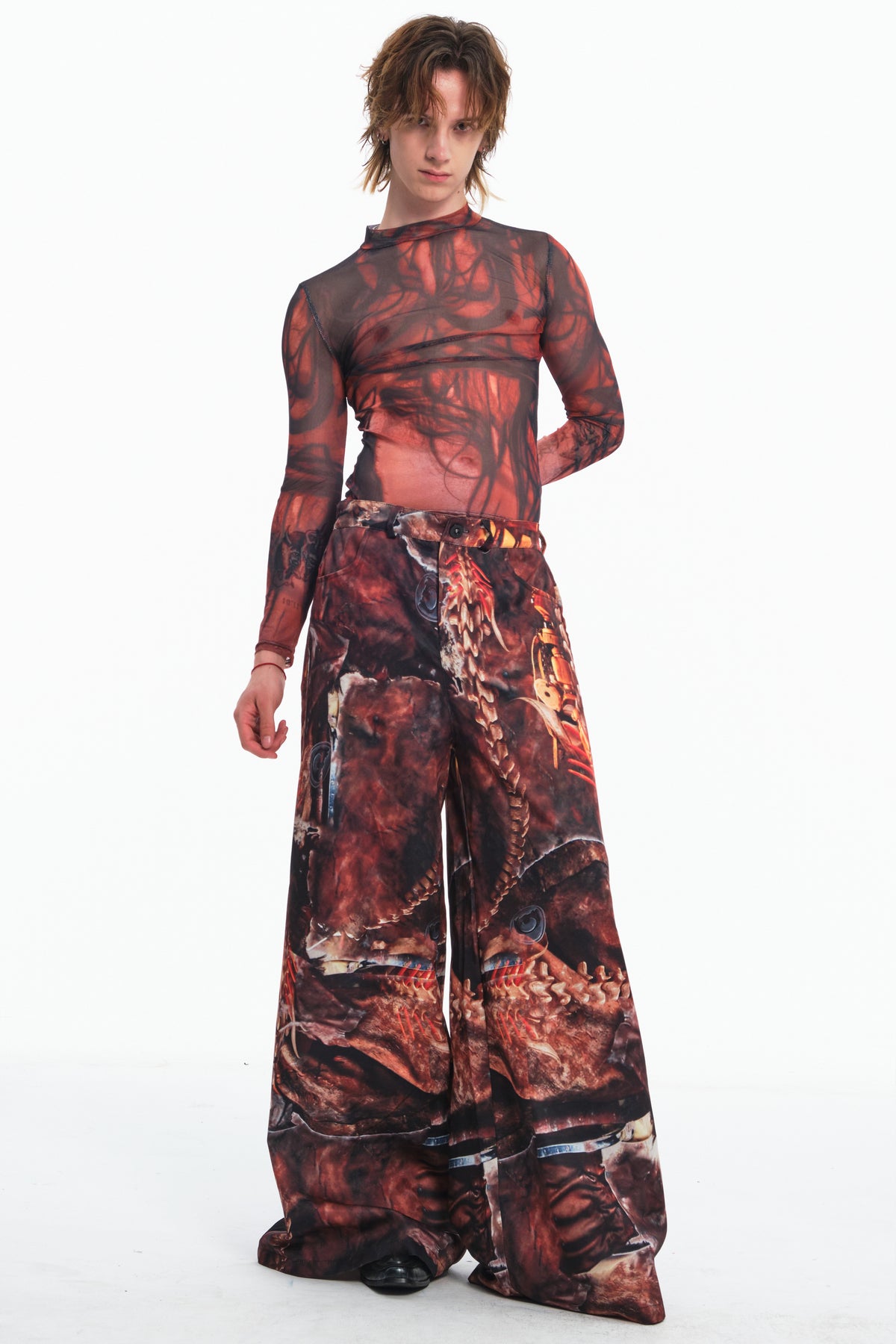 EMBRYO BONE RELIC printed wide-leg pants — rear modeled view