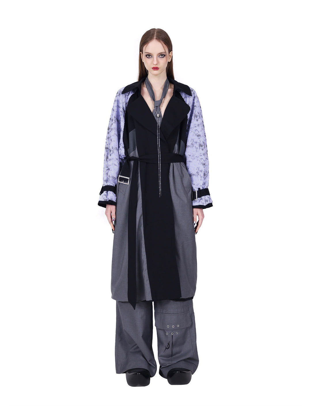 PINKSPINK ELECTRIC MOON reversible patchwork trench coat in black and gray — straight-on belted reverse showing contrasting front panels