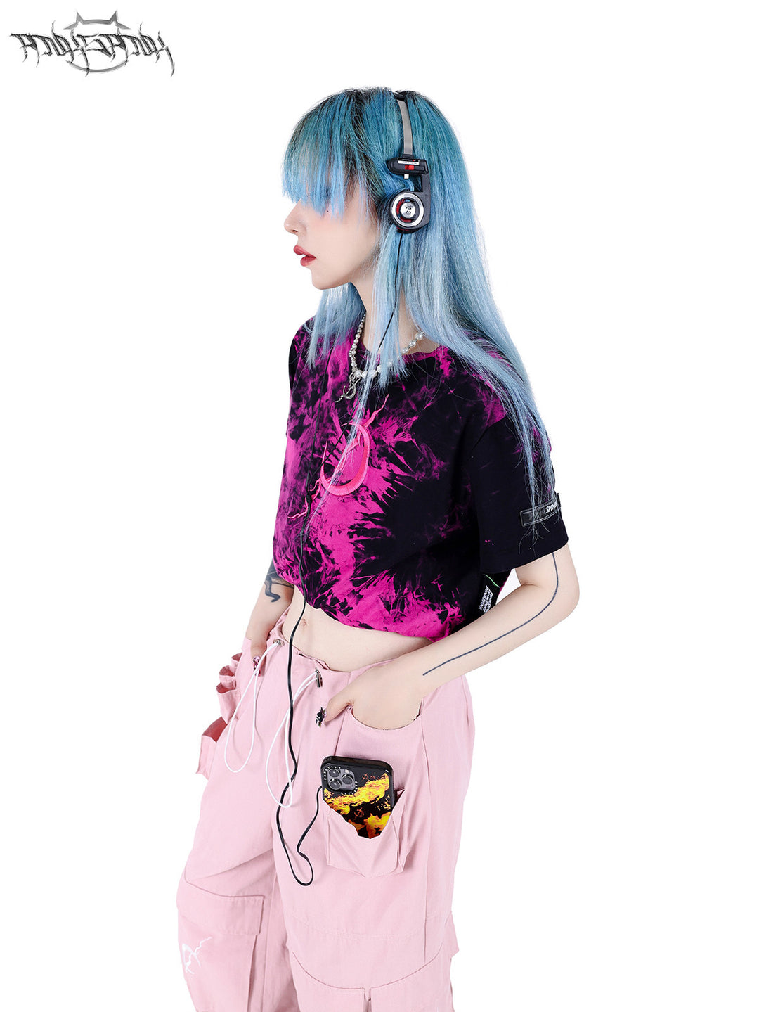 PINKSPINK ELECTRIC MOON double-layer tie-dye crop tee — pink-black side close-up showing the cropped hem