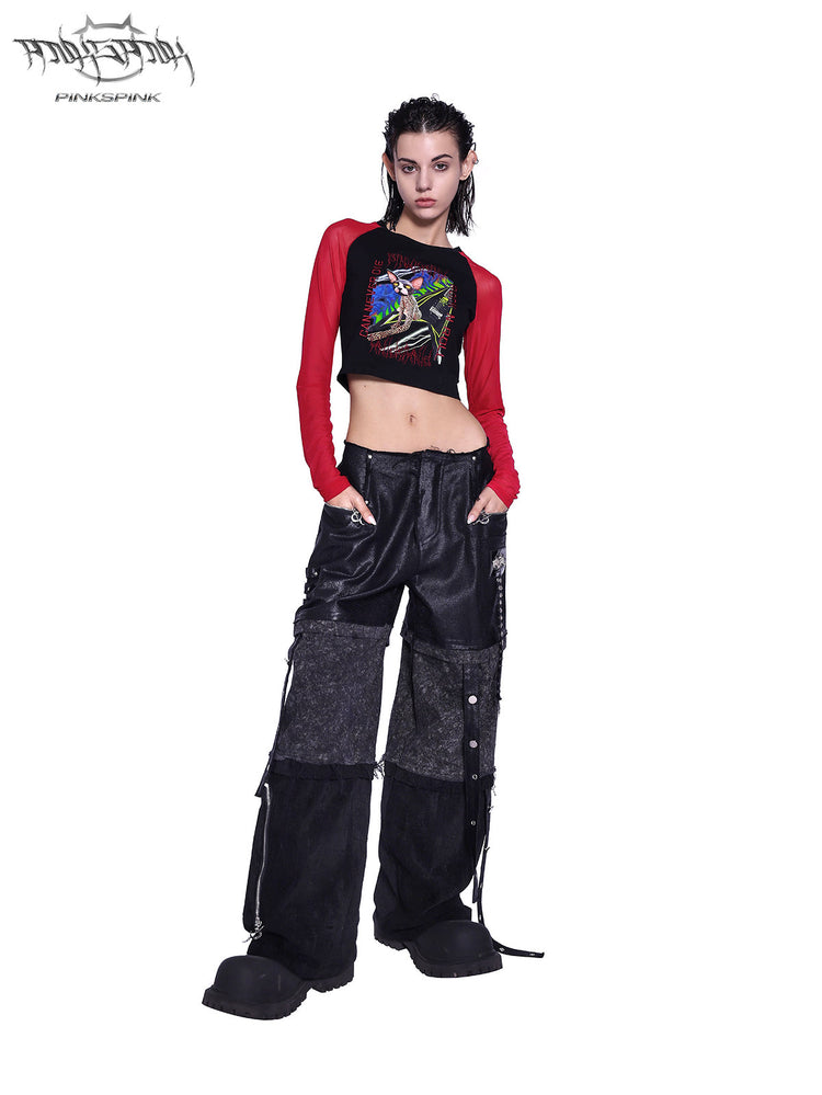 PINKSPINK SPHYNX red mesh-sleeve cropped graphic tee — black and red cropped tee — full-length front view with hands in pockets