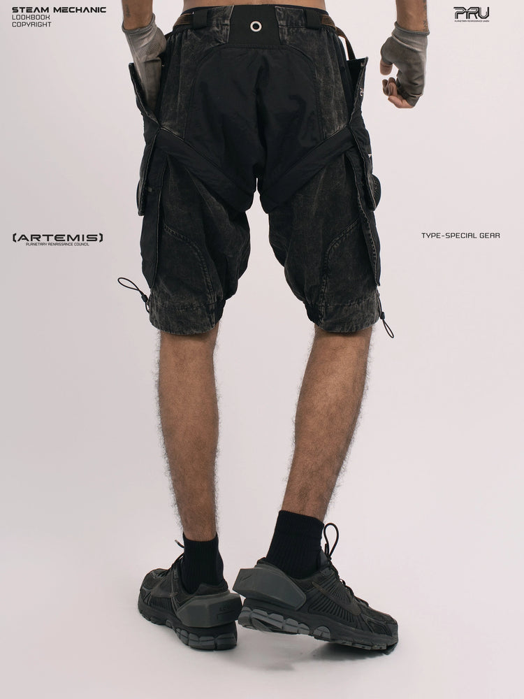 ARTEMIS blackbird black detachable technical shorts — rear modeled view showing panel seams
