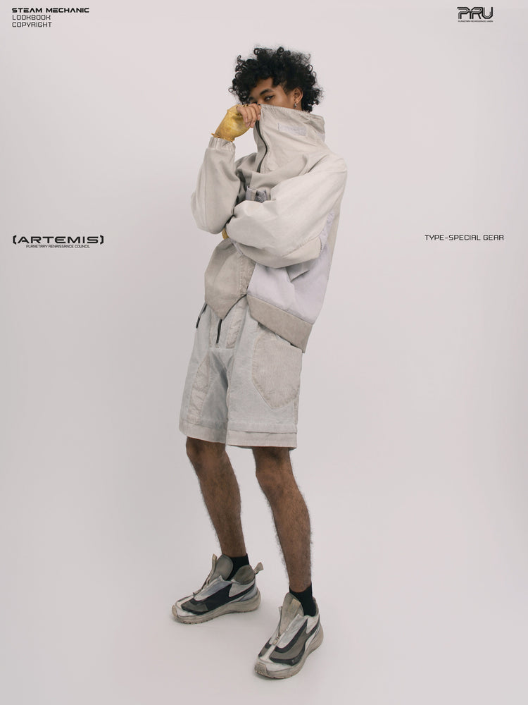 PIONEER eris white detachable-pocket utility hoodie — side modeled view with hands at the high collar