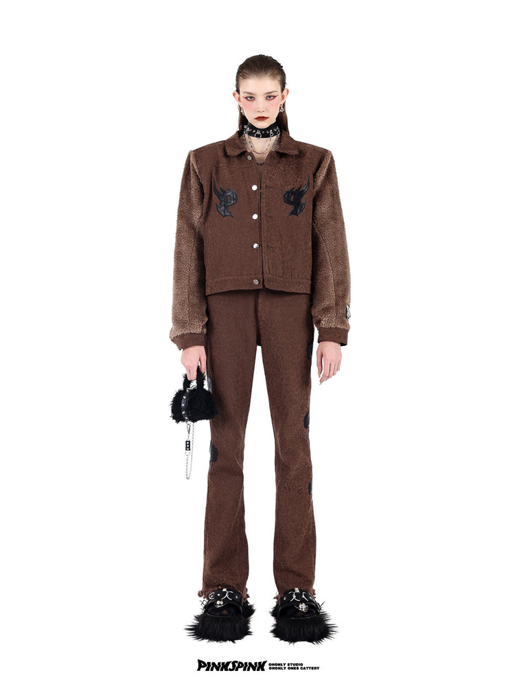 PINKSPINK SPIKE RING studded chain choker in black — full-length front modeled view with a brown jacket and matching trousers