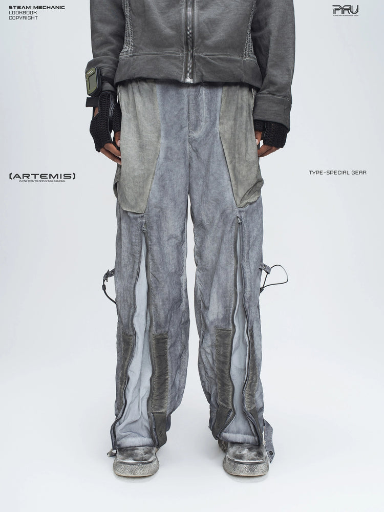 STARCORE moon dust gray engineer utility pants — front lower-body modeled view with the leg zippers open