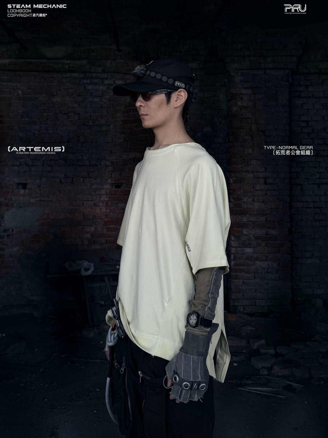 ERODED SPINE distressed asymmetric tee — full-length styled view