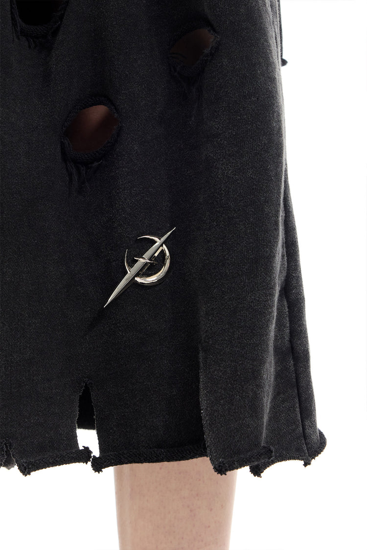 PINKSPINK ELECTRIC MOON distressed embroidered wide-leg shorts — black — close-up of the moon emblem and distressed hem
