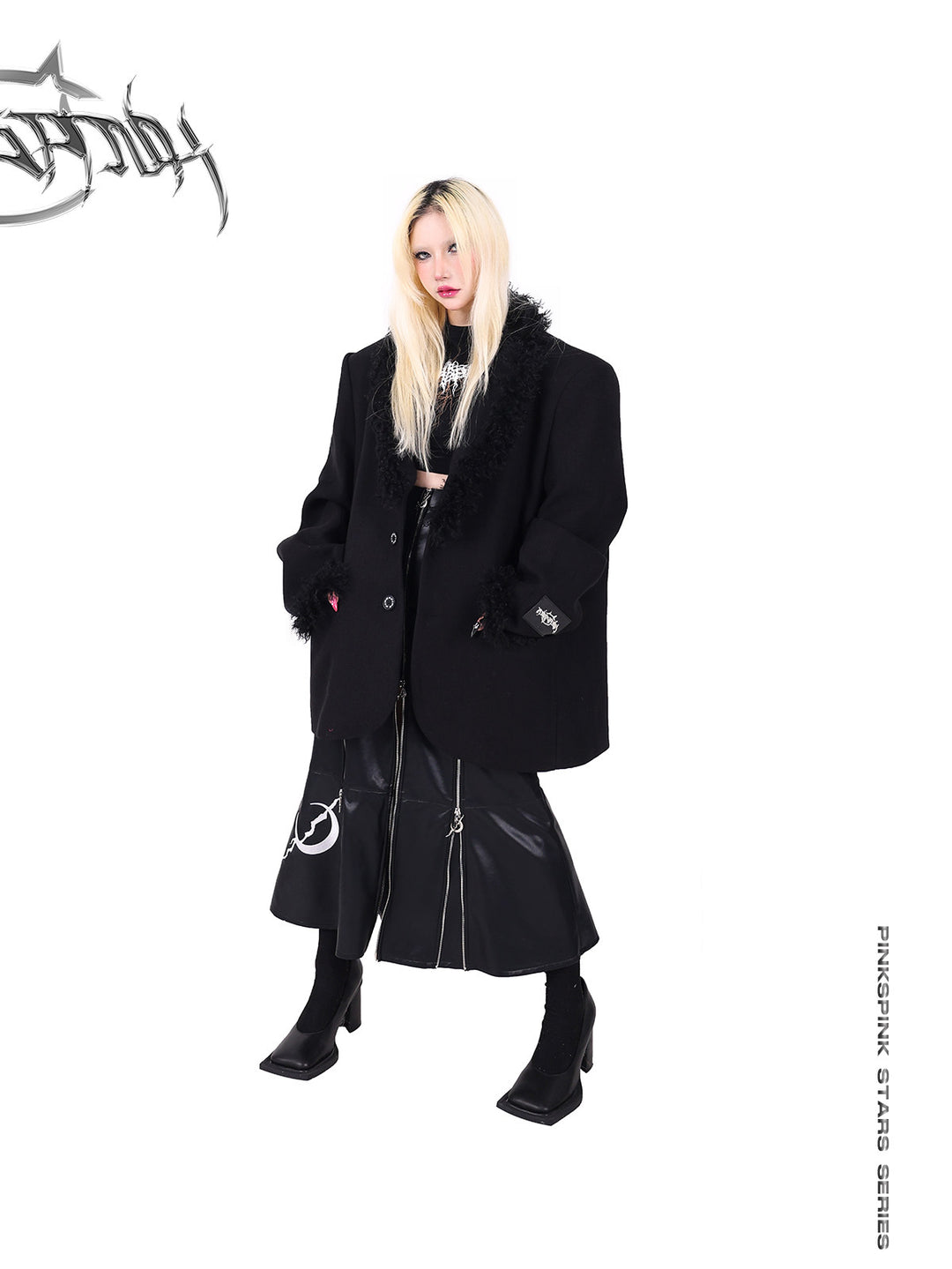 PINKSPINK ELECTRIC MOON zip-panel faux-leather maxi skirt — angled full-length modeled view styled with a black fur-trim blazer