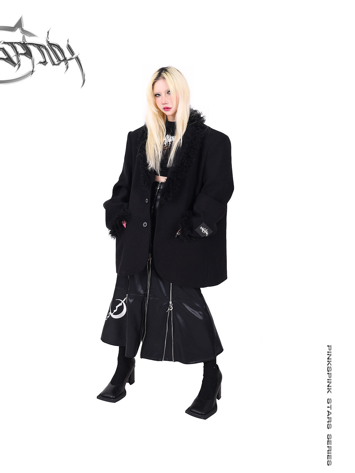 PINKSPINK ELECTRIC MOON zip-panel faux-leather maxi skirt — angled full-length modeled view styled with a black fur-trim blazer