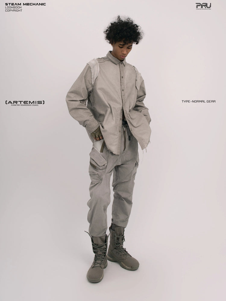 CHAOS ERA nightfall gray raw-edge technical shirt — full-length front modeled view with hands in pockets