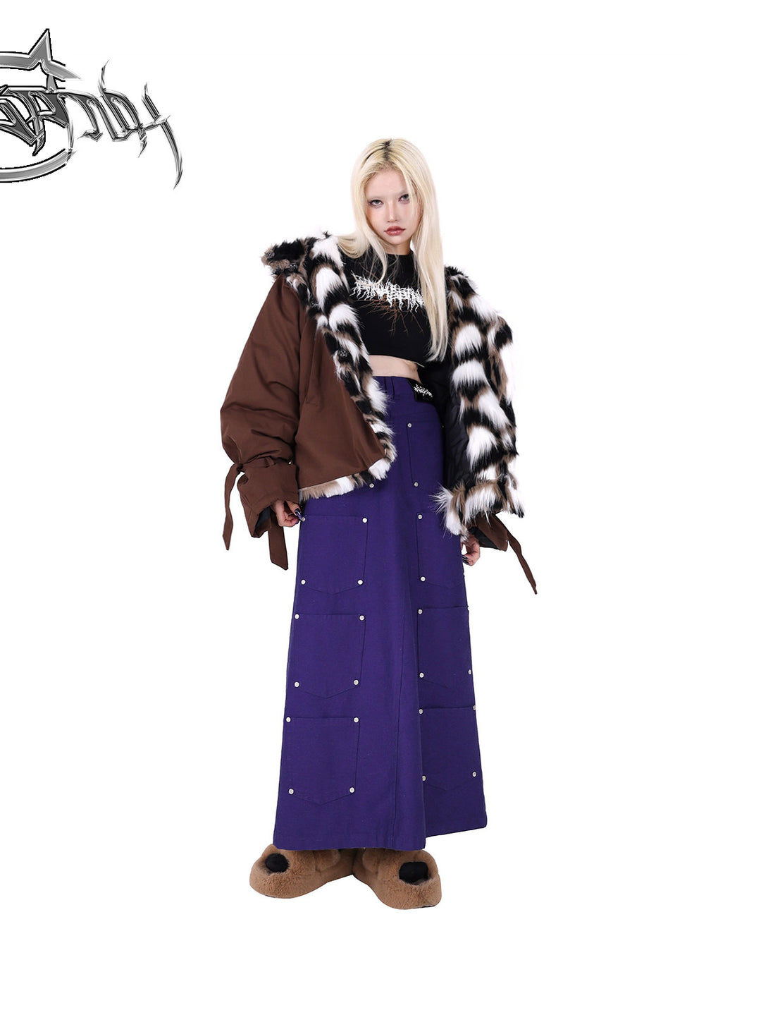 PINKSPINK DNA reconstructed multi-pocket denim maxi skirt — angled front modeled view styled with a padded jacket