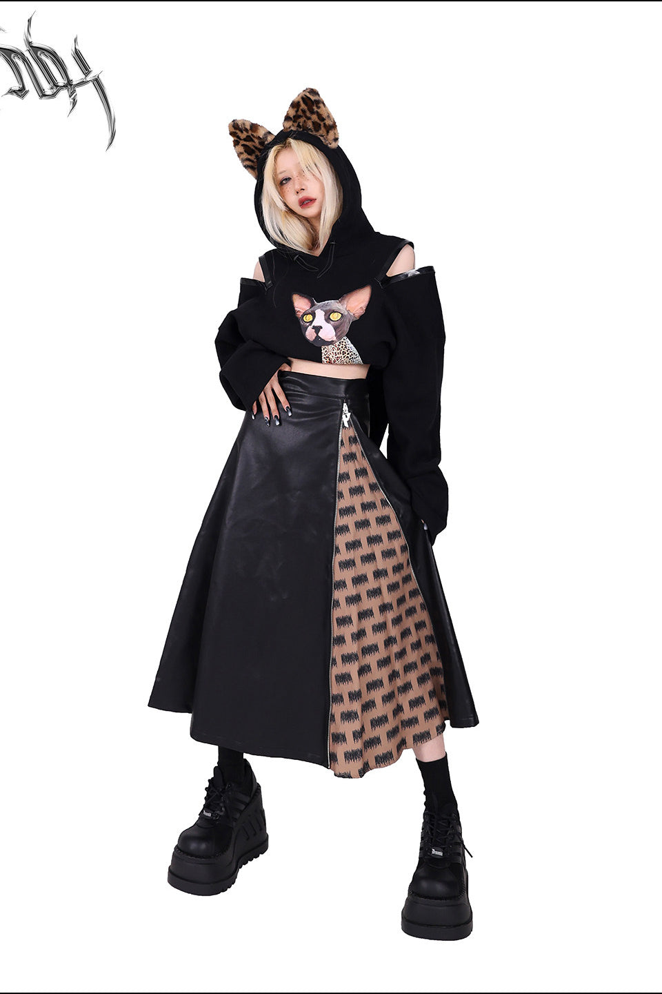 PINKSPINK EXHIBITION CORE zip A-line midi skirt — product detail view showing texture and hardware