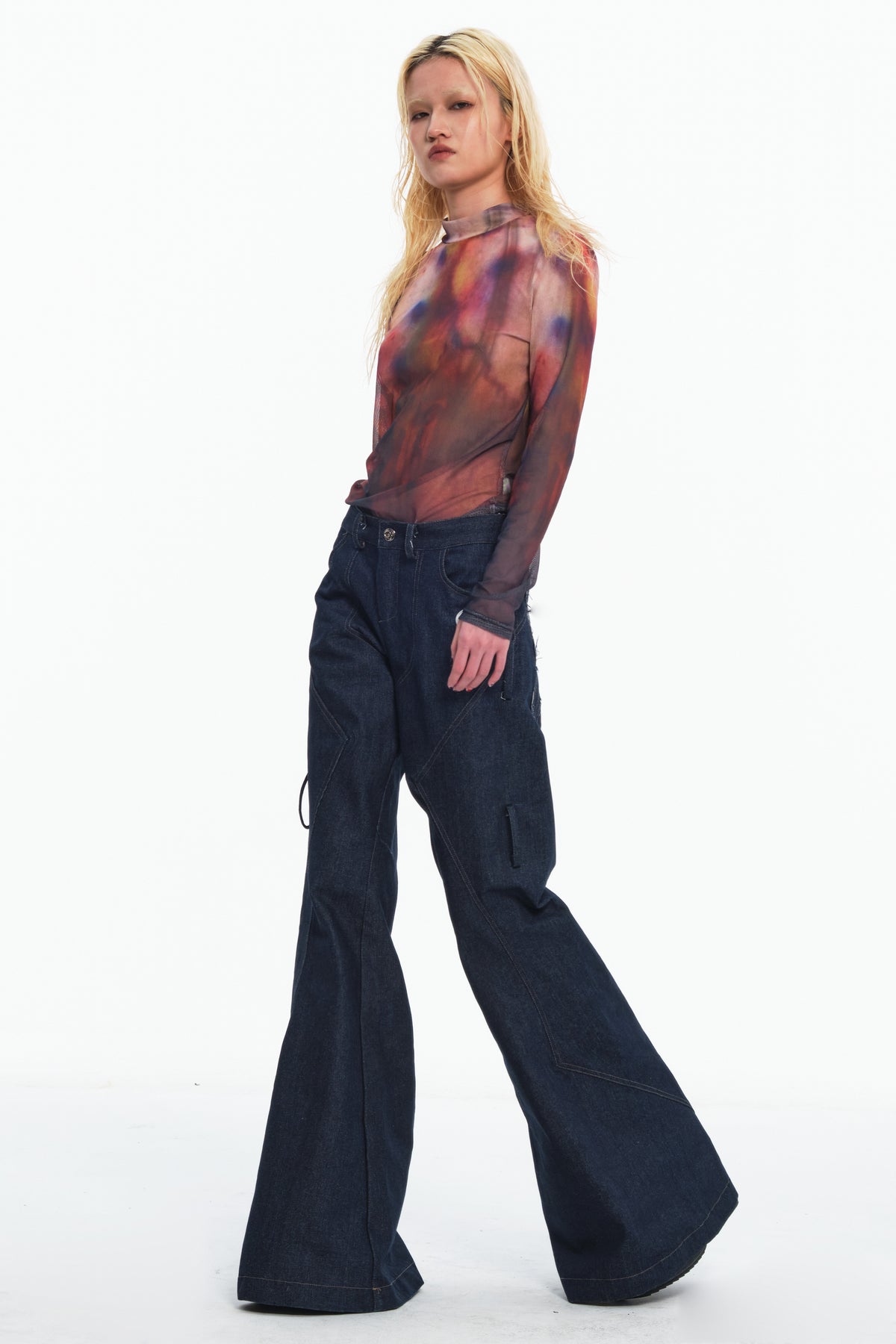 EMBRYO BONE FRAME low-rise flare pants & waist panel — rear modeled view