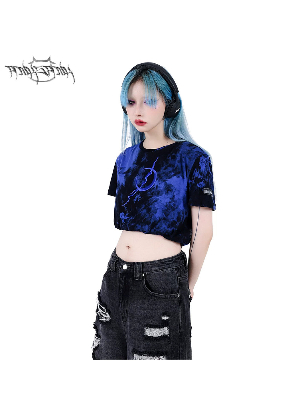 PINKSPINK ELECTRIC MOON double-layer tie-dye crop tee — blue-black upper-body modeled view showing Electric Moon embroidery