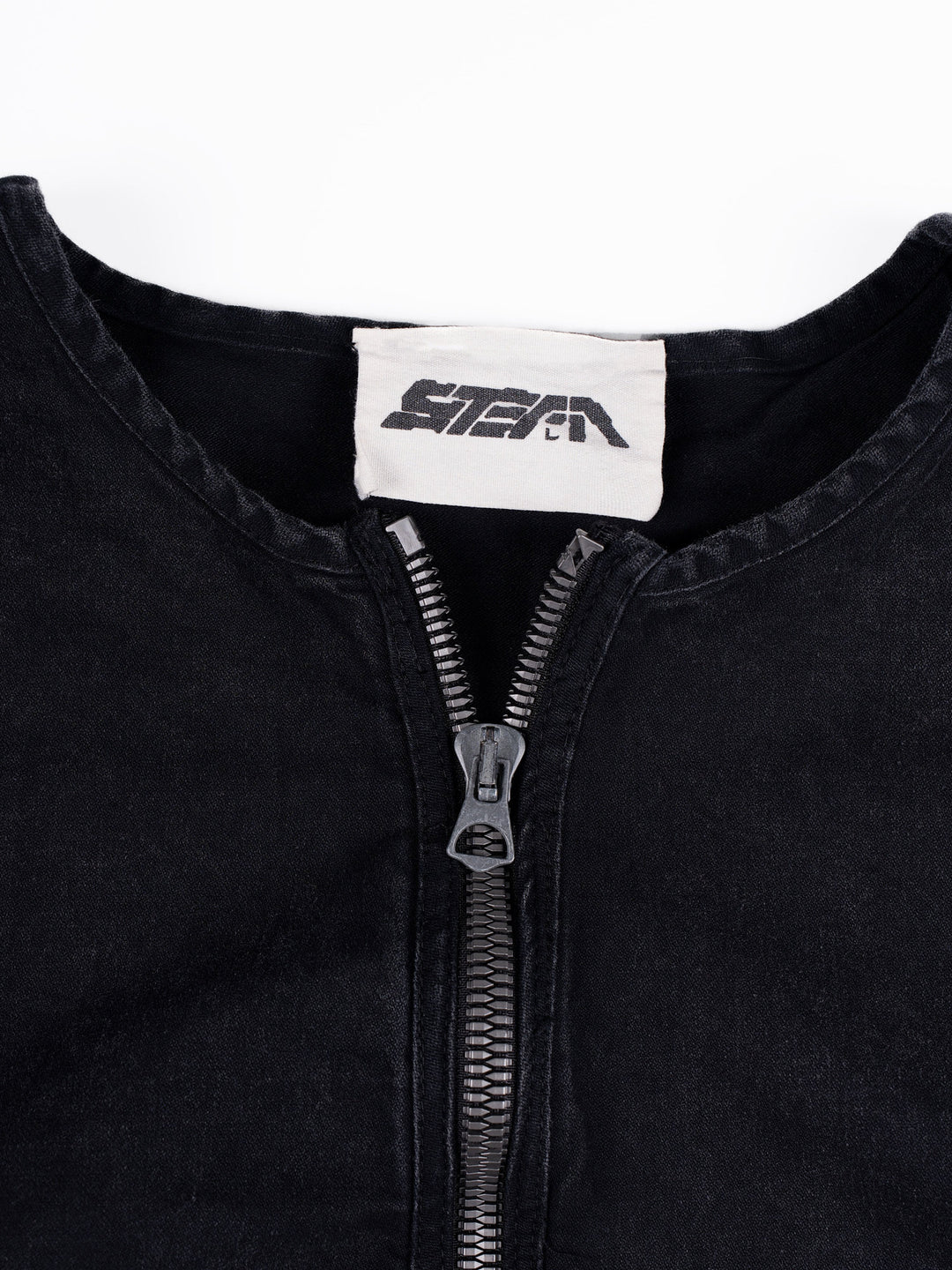 GAIA night black priest zip robe jacket — round neckline and sewn STEAM label close-up
