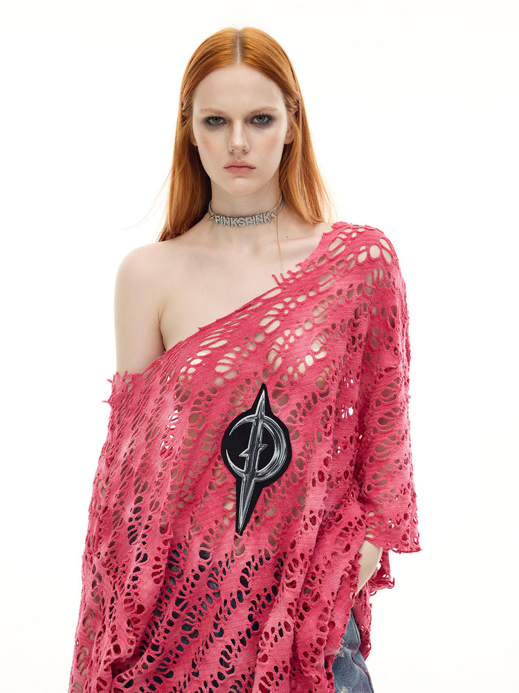 PINKSPINK ELECTRIC MOON distressed open-knit oversized tee in pink — close front modeled view of the distressed knit and moon emblem