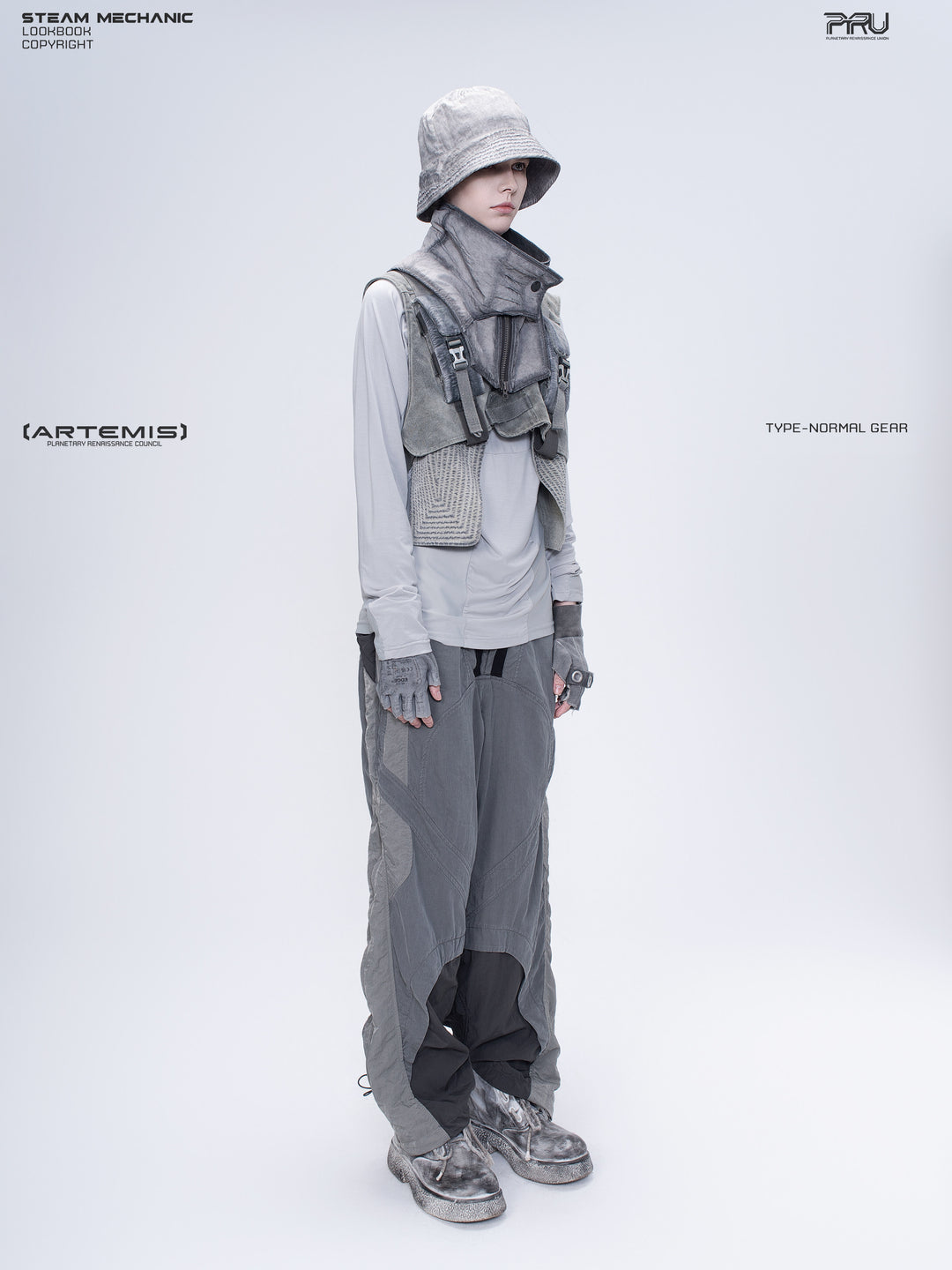 ARTEMIS moon dust gray stretch technical base-layer top — opposite three-quarter modeled view with arms lowered