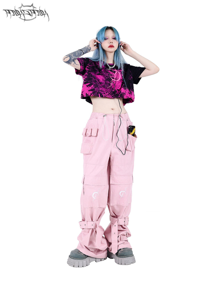 PINKSPINK ELECTRIC MOON double-layer tie-dye crop tee — pink-black full-length modeled view with hands on headphones