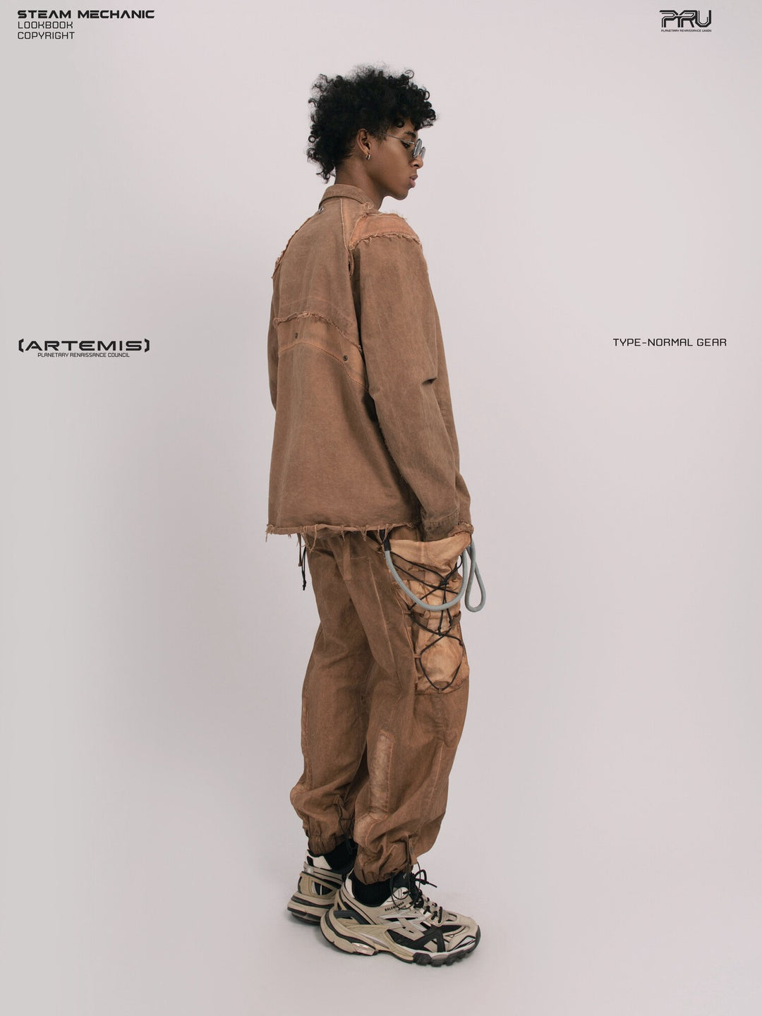 CHAOS ERA raw-edge technical shirt in soft dawn orange — full-length side modeled view