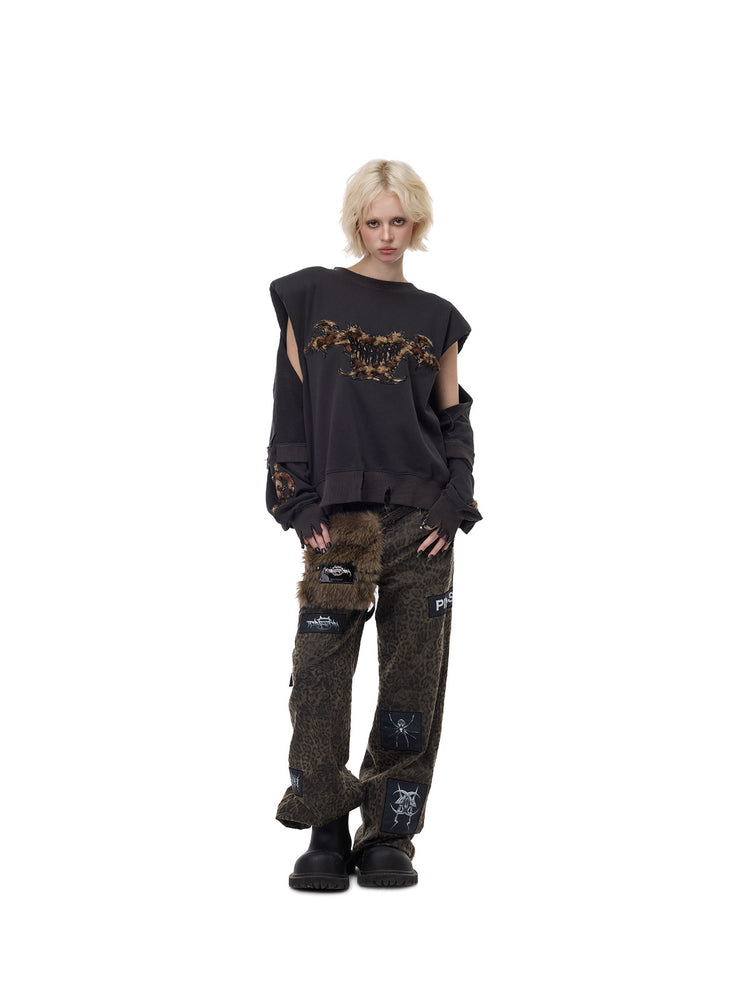 PINKSPINK LEOPARD RIOT detachable-pouch wide-leg pants — front full-length styling with cutout sweatshirt