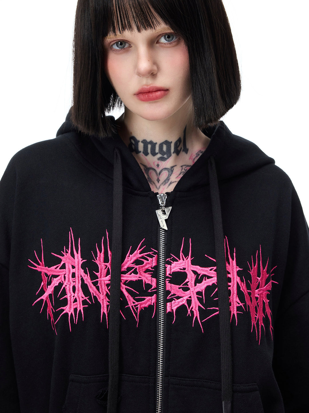 PINKSPINK MOHAWK RITUAL studded zip-up hoodie — front close-up of pink graphic and zipper