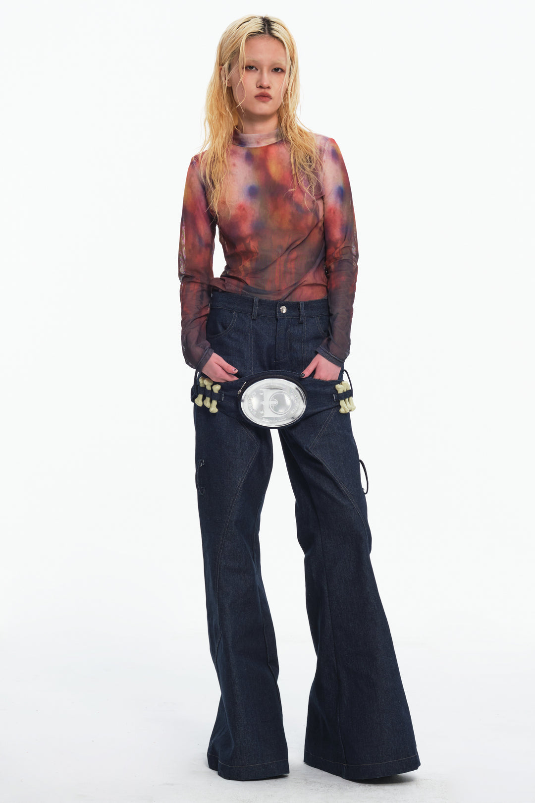 EMBRYO BONE FRAME low-rise flare pants & waist panel — construction detail