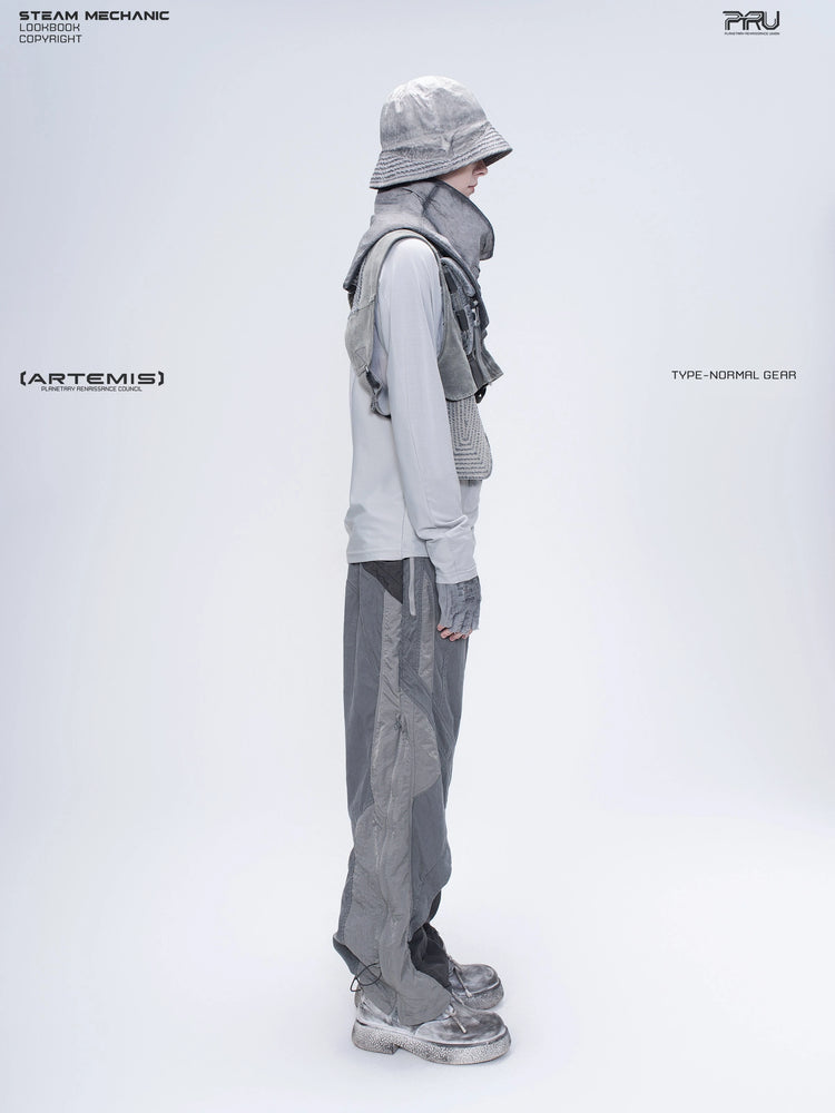 ARTEMIS moon dust gray stretch technical base-layer top — opposite side full-length styling view with a separate utility vest