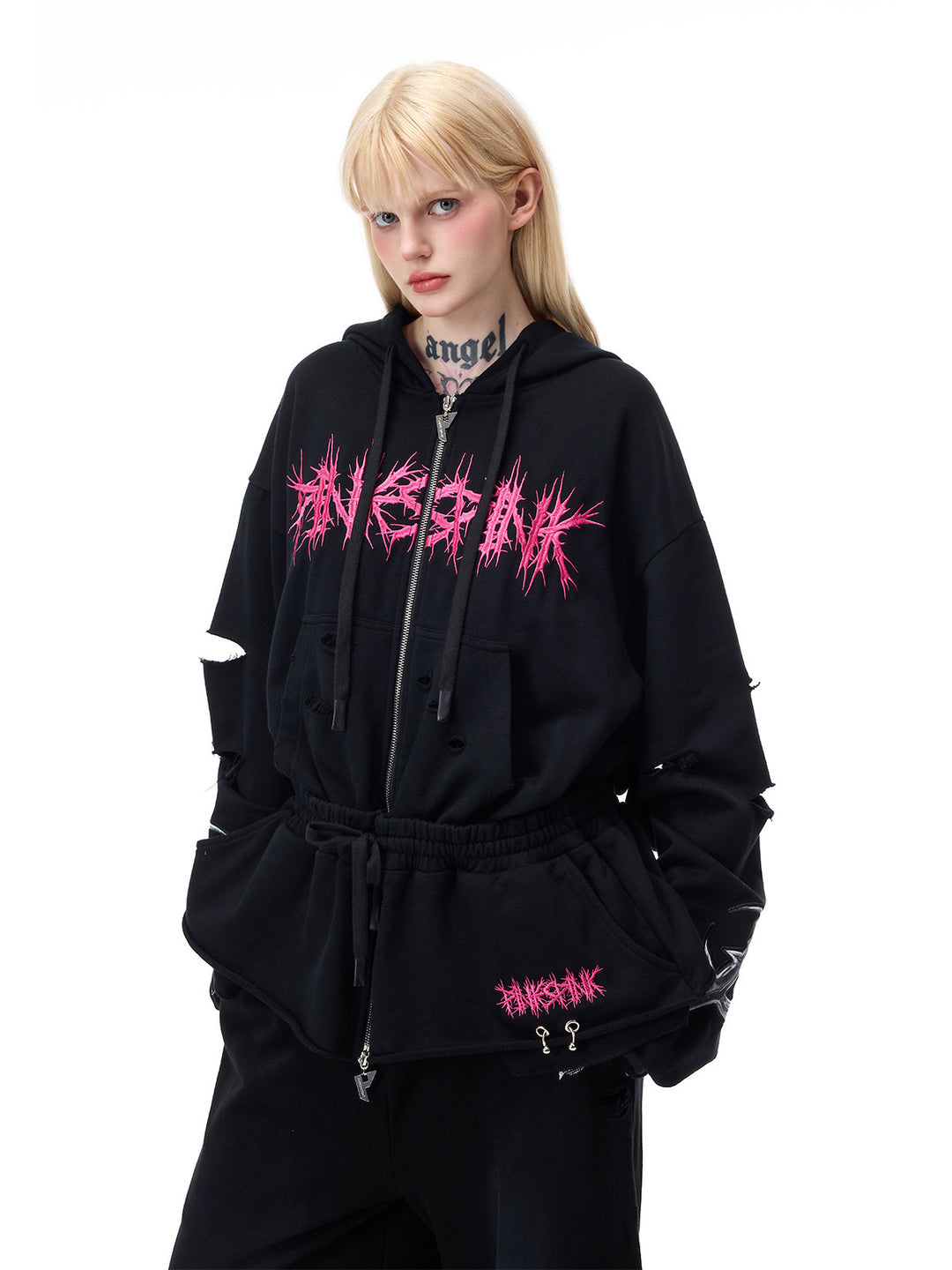 PINKSPINK MOHAWK RITUAL studded zip-up hoodie — front modeled view showing drawstring waist