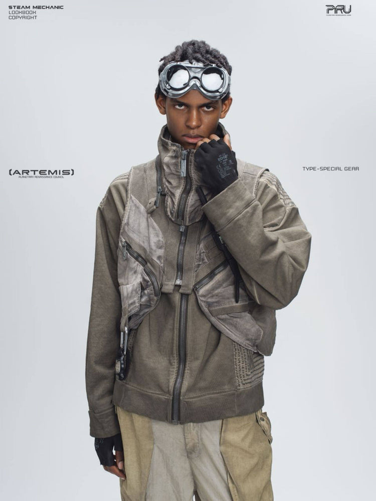 FISSION modular vest — mercury brown modeled portrait with raised glove