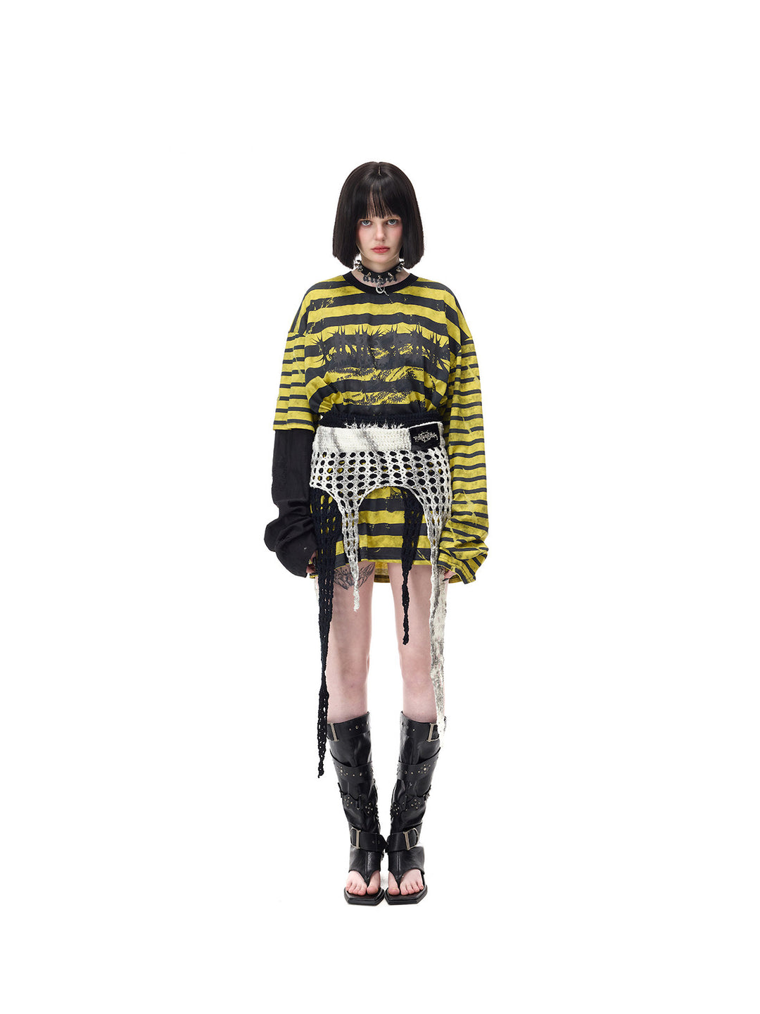 PINKSPINK STATIC asymmetric striped burnout long-sleeve tee in black and yellow — centered full-length front modeled view with a separate white open-knit waist layer, repeated in the hero collage