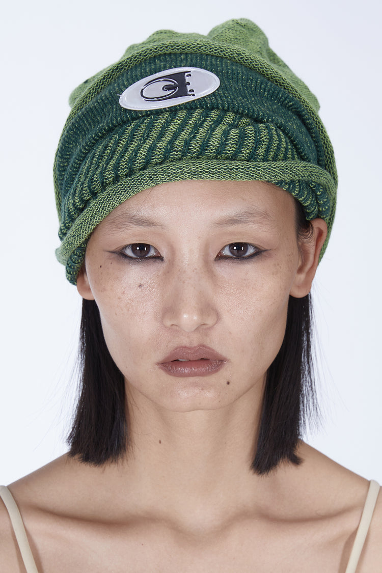 EMBRYO DOUBLE FORM convertible knit hat — full-length modeled view