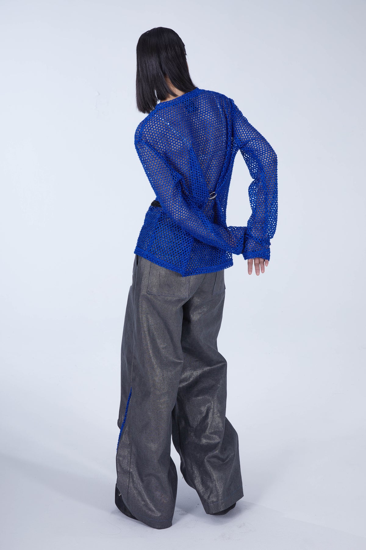 EMBRYO BLUE VOID cutout mesh finger-sleeve top — rear modeled view