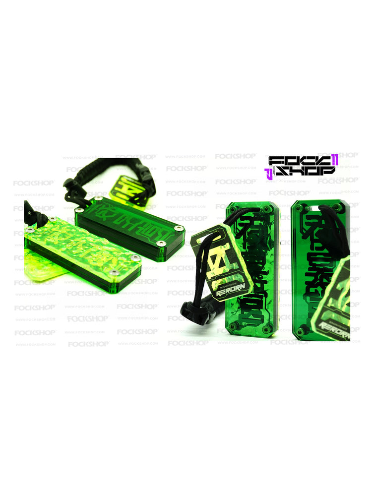 FOCKSHOP REBORN talisman charm — white-background comparison of green front and rear construction