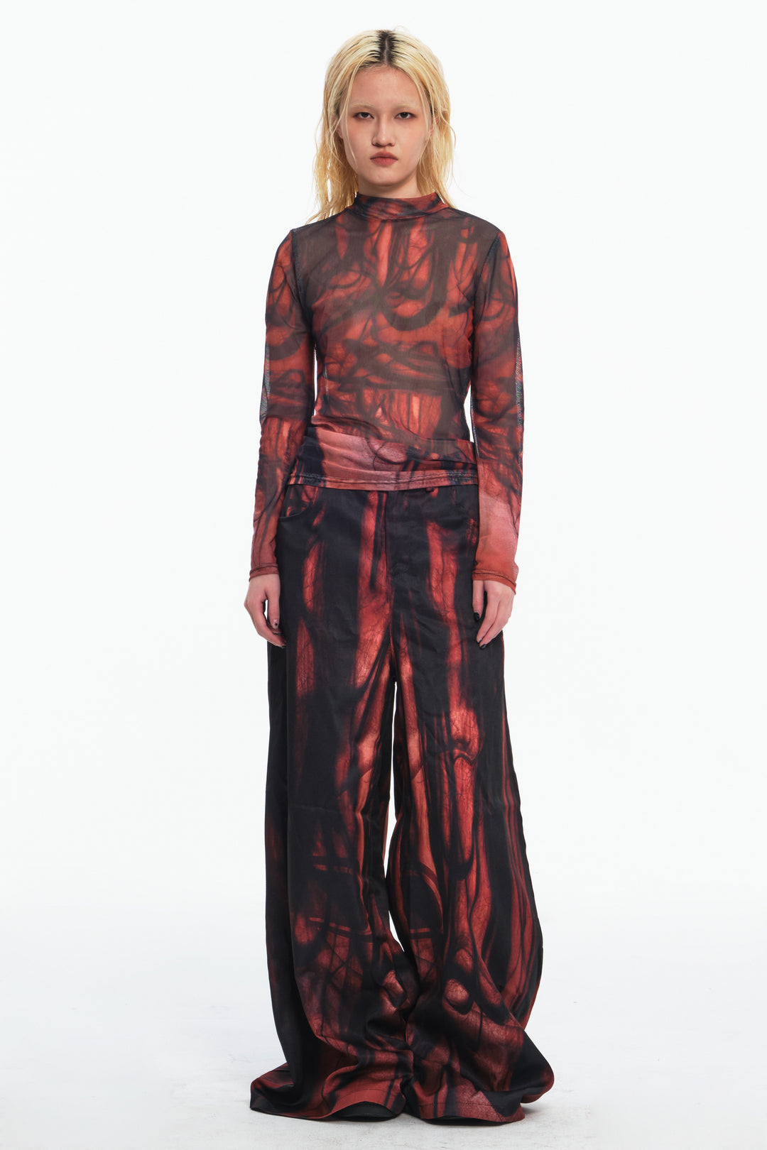EMBRYO NERVE BLOOM printed flare pants — garment-only view